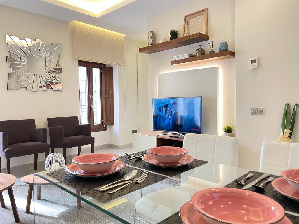 A television and/or entertainment centre at Gav Espinel Ronda Centro