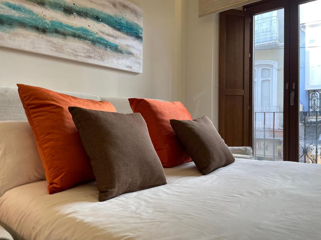 A bed or beds in a room at Gav Espinel Ronda Centro