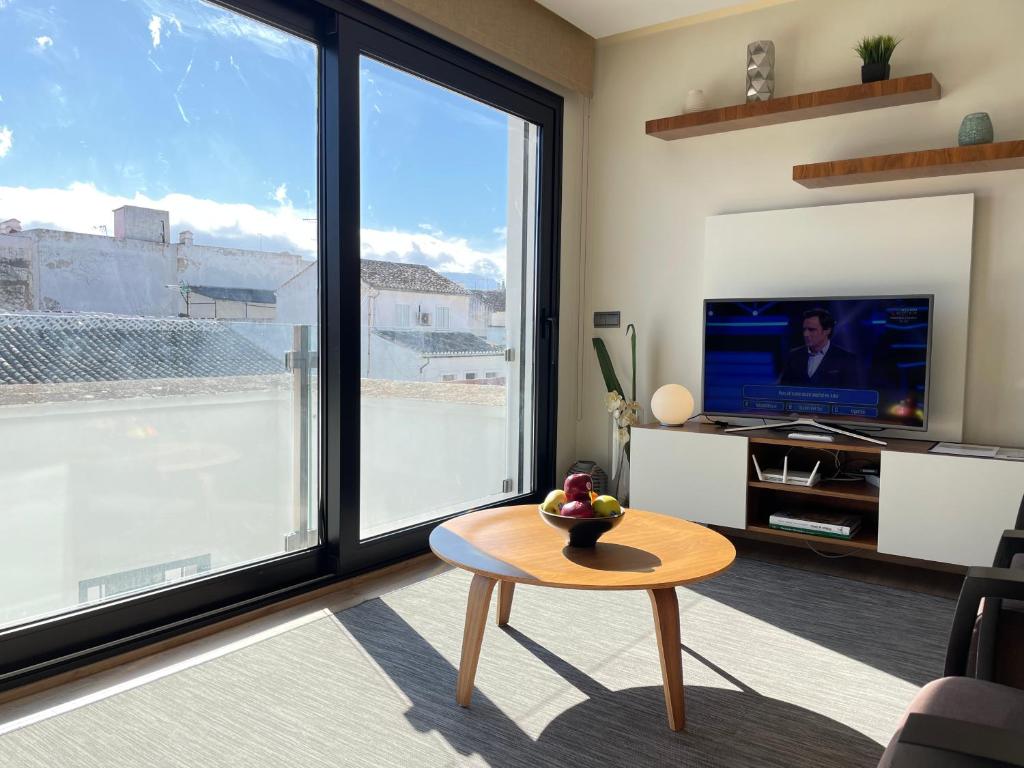 A television and/or entertainment centre at Gav Espinel Ronda Centro