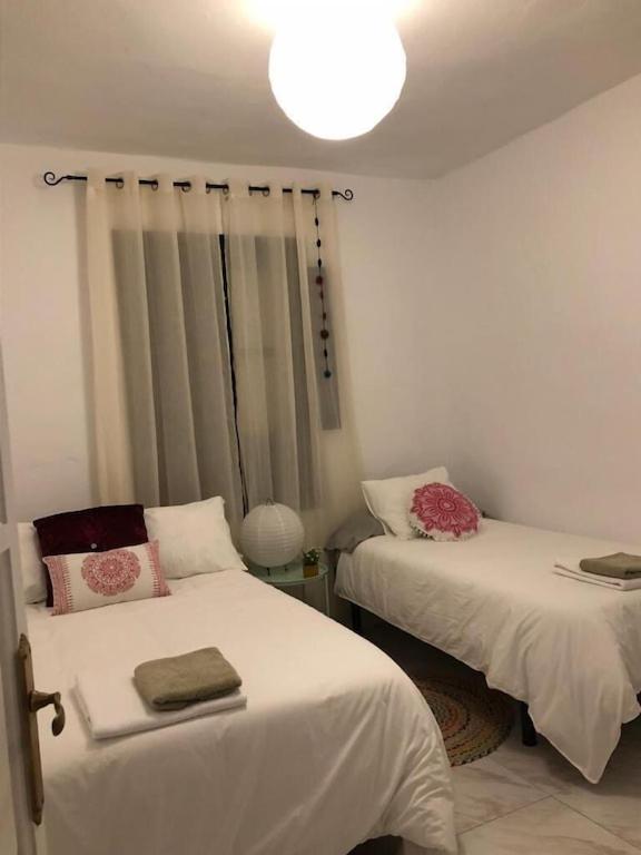Postel nebo postele na pokoji v ubytování Casa Bheinn