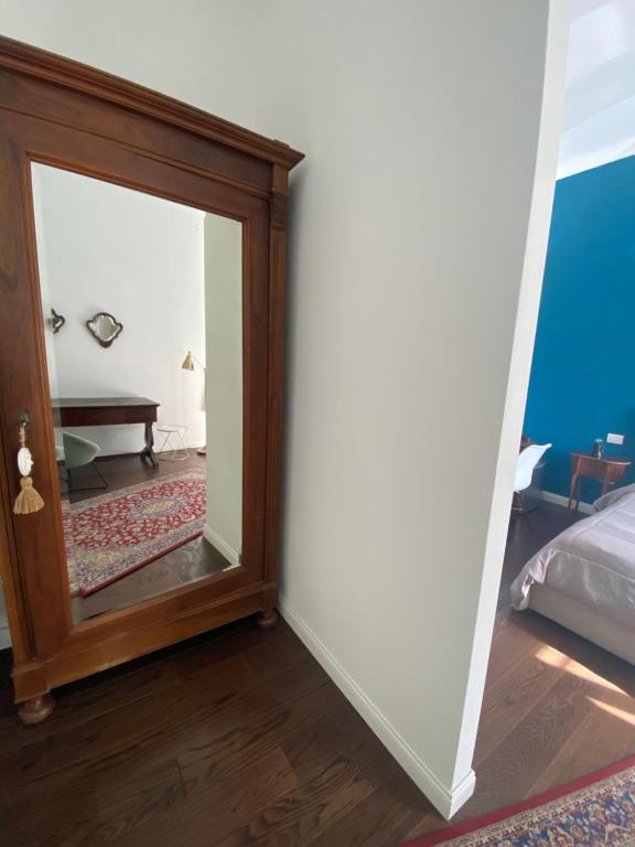 Postel nebo postele na pokoji v ubytování Ortigia Twin Rooms
