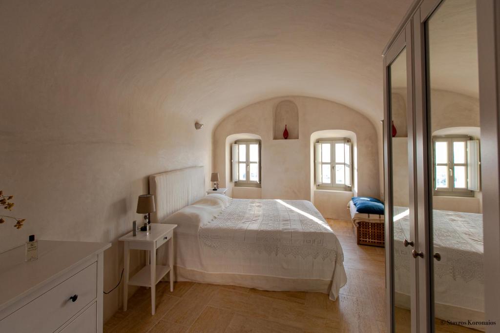 En eller flere senge i et værelse på Castelli Porta