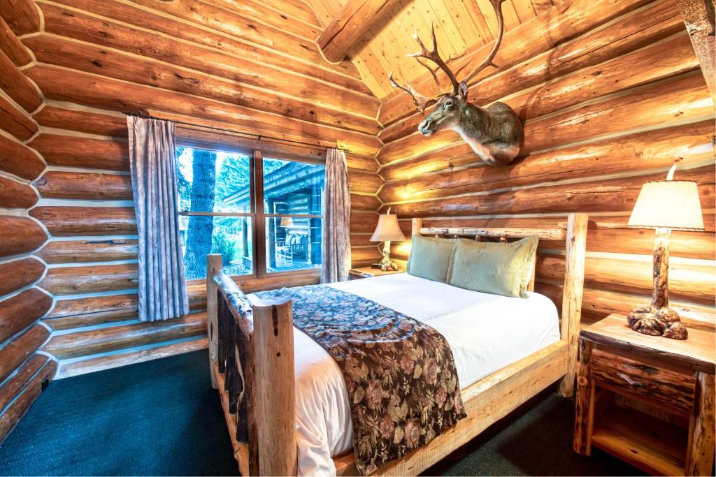 Postel nebo postele na pokoji v ubytování The Hatchet Resort