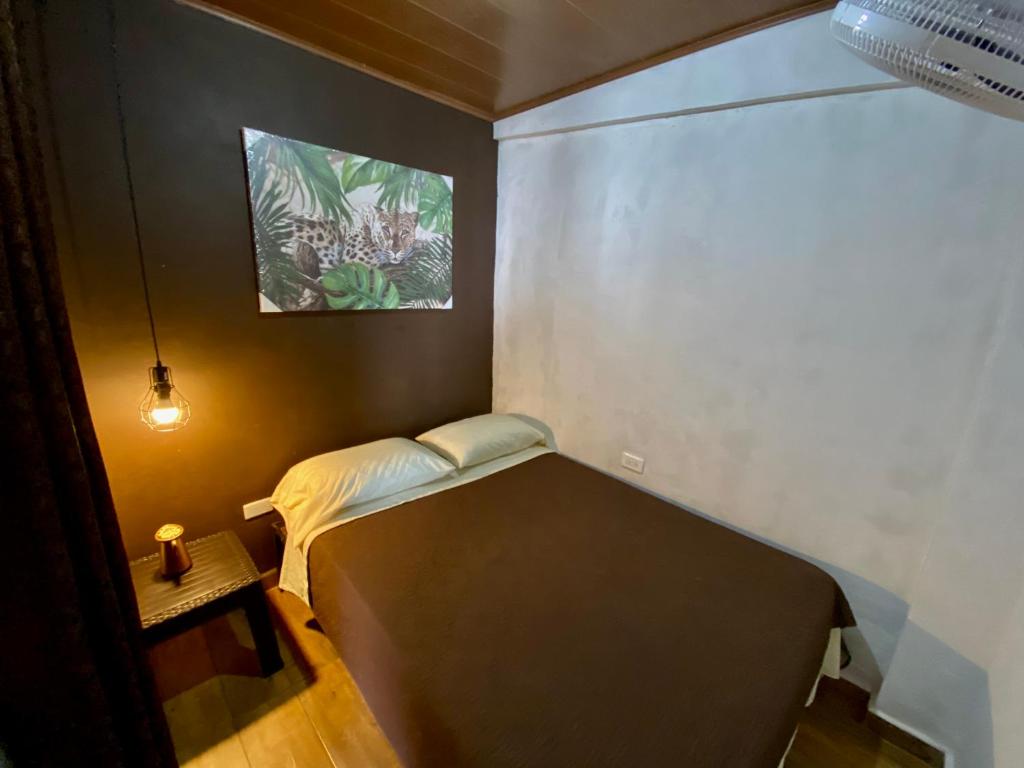 Postel nebo postele na pokoji v ubytování Hacienda Mi Montañita