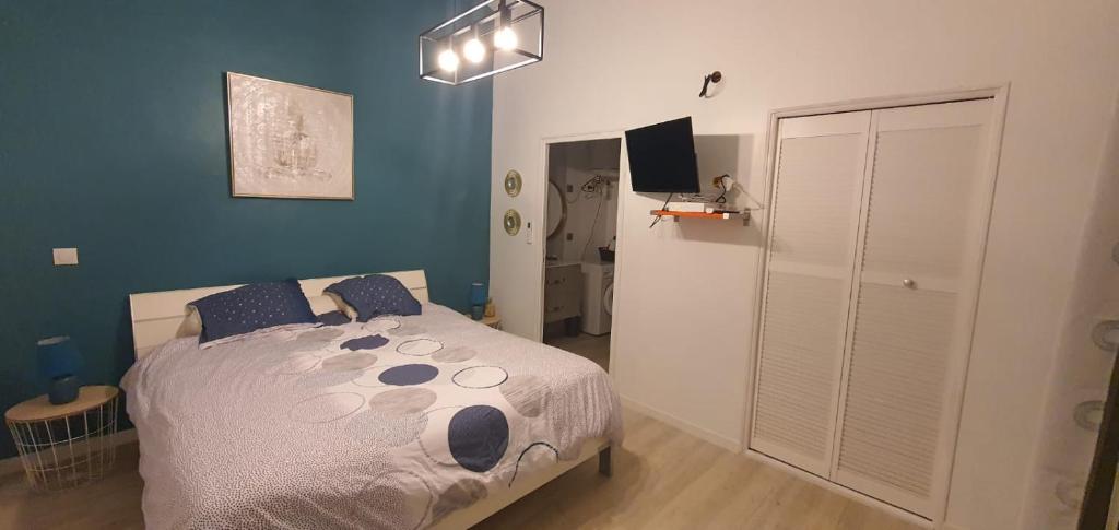 Postel nebo postele na pokoji v ubytování LE MANGUIER
