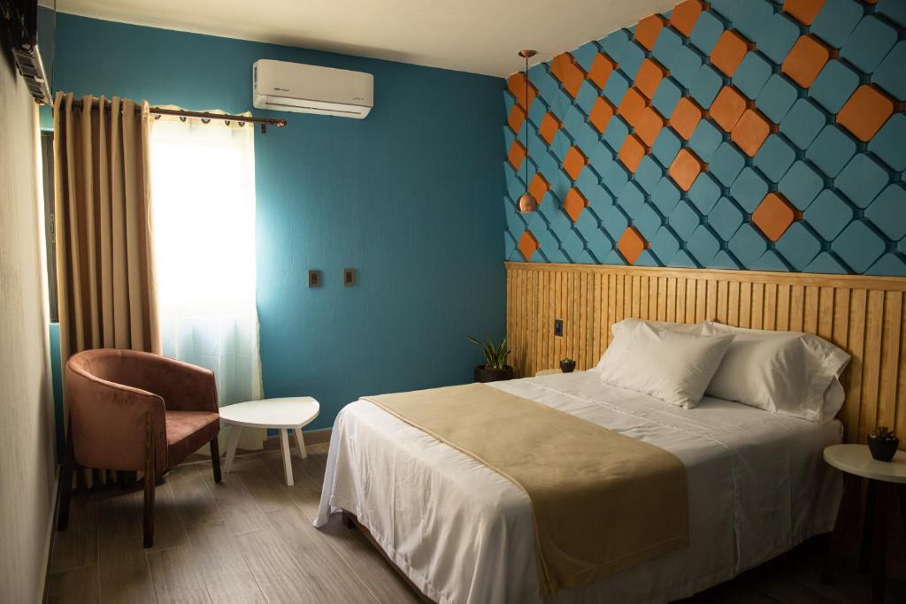Postel nebo postele na pokoji v ubytování Hotel Casa Jima Agave