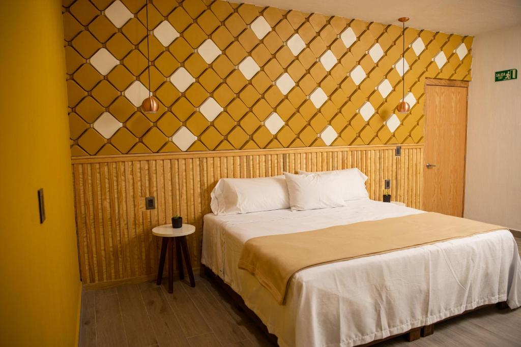 Postel nebo postele na pokoji v ubytování Hotel Casa Jima Agave