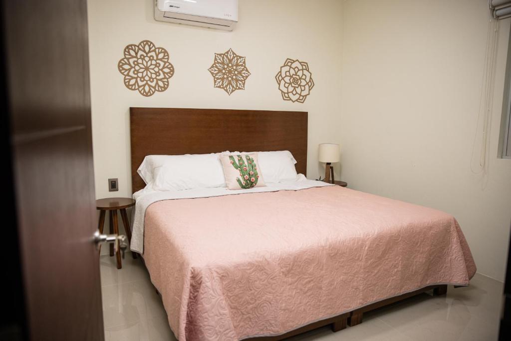 Postel nebo postele na pokoji v ubytování Hotel Casa Jima Agave