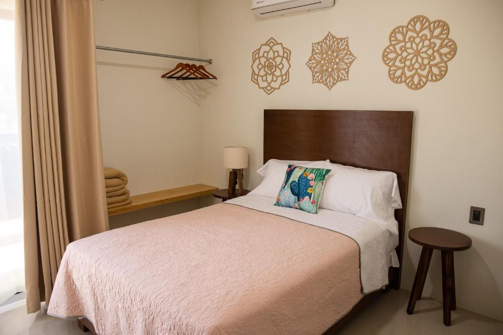 Postel nebo postele na pokoji v ubytování Hotel Casa Jima Agave