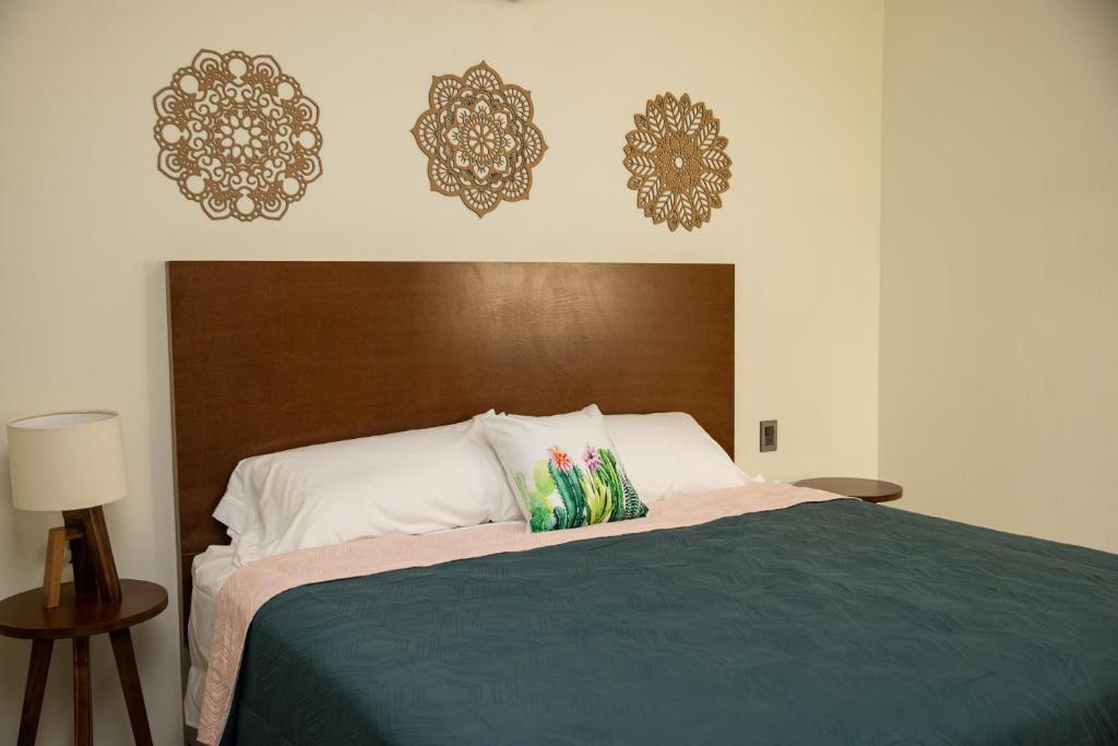 Postel nebo postele na pokoji v ubytování Hotel Casa Jima Agave