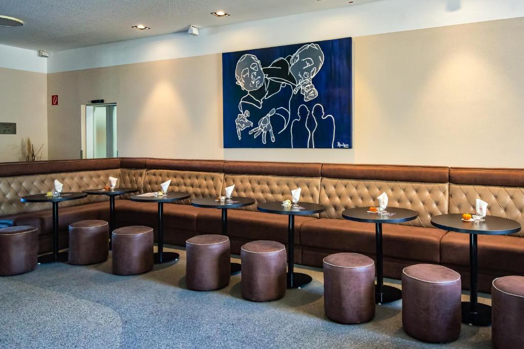 A seating area at Neufeldersee Hotel & Restaurant