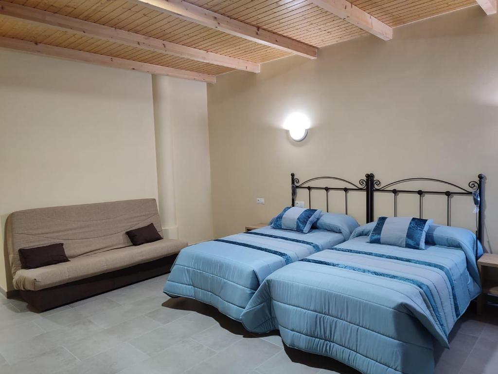 Posteľ alebo postele v izbe v ubytovaní Hotel Novo