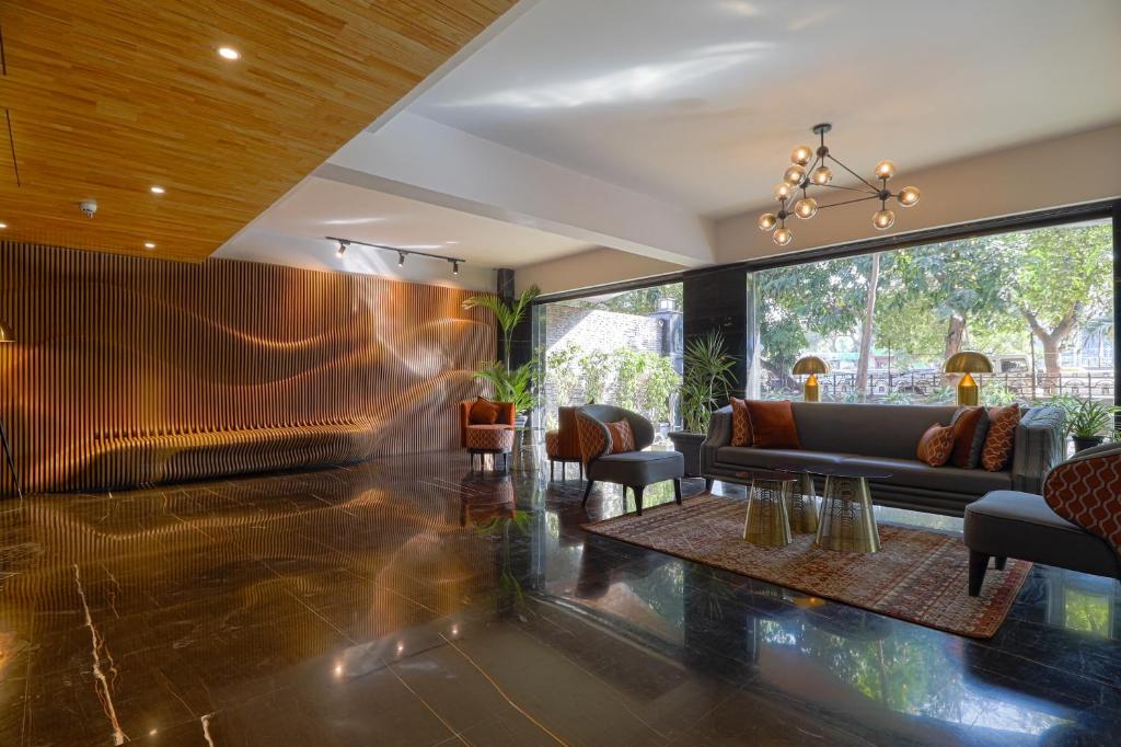 Posezení v ubytování AIR by Ahuja Residences