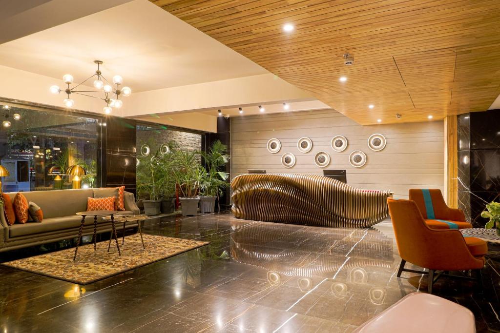Posezení v ubytování AIR by Ahuja Residences