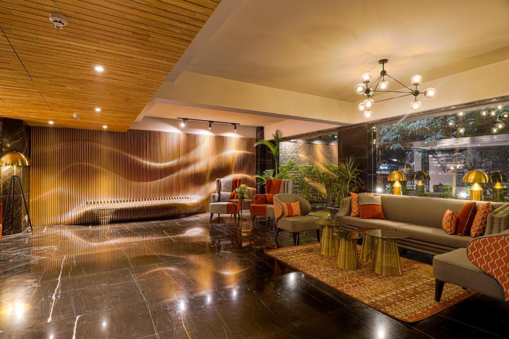 Posezení v ubytování AIR by Ahuja Residences