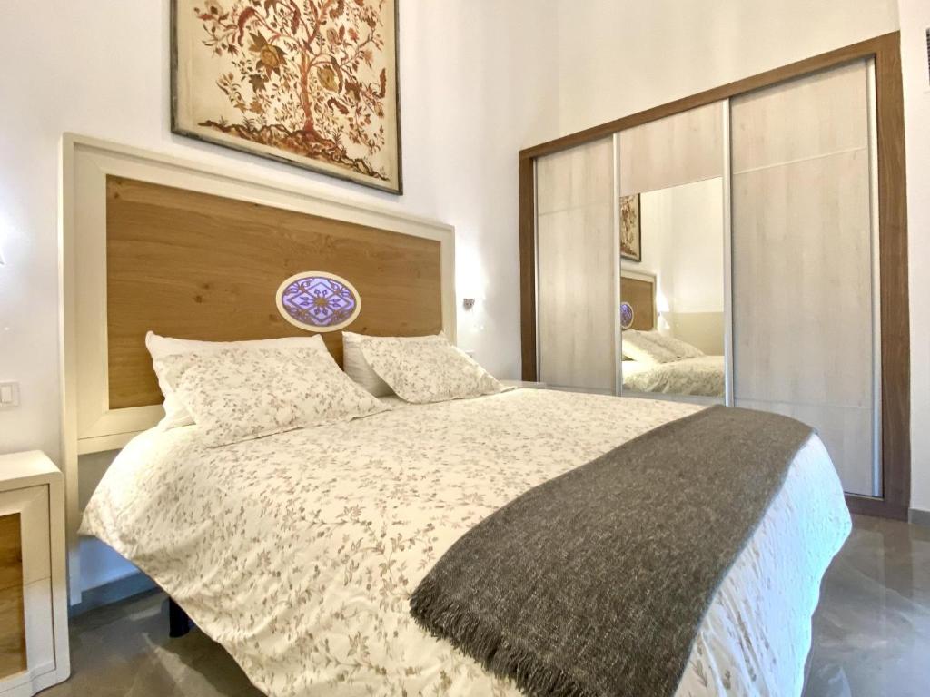 Posteľ alebo postele v izbe v ubytovaní Tr2 Aparcamiento Incluido amplio y moderno loft cartuja de sevilla