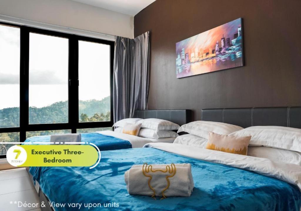 Postel nebo postele na pokoji v ubytování 7Stonez Residences Midhills Genting Highlands