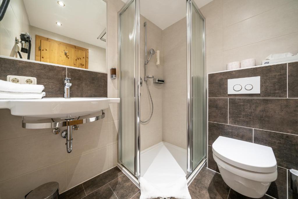 Koupelna v ubytování Hotel Similaun