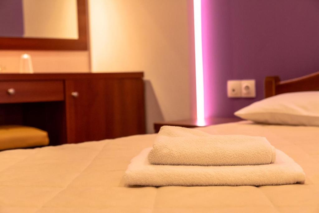 Postel nebo postele na pokoji v ubytování Telis Hotel