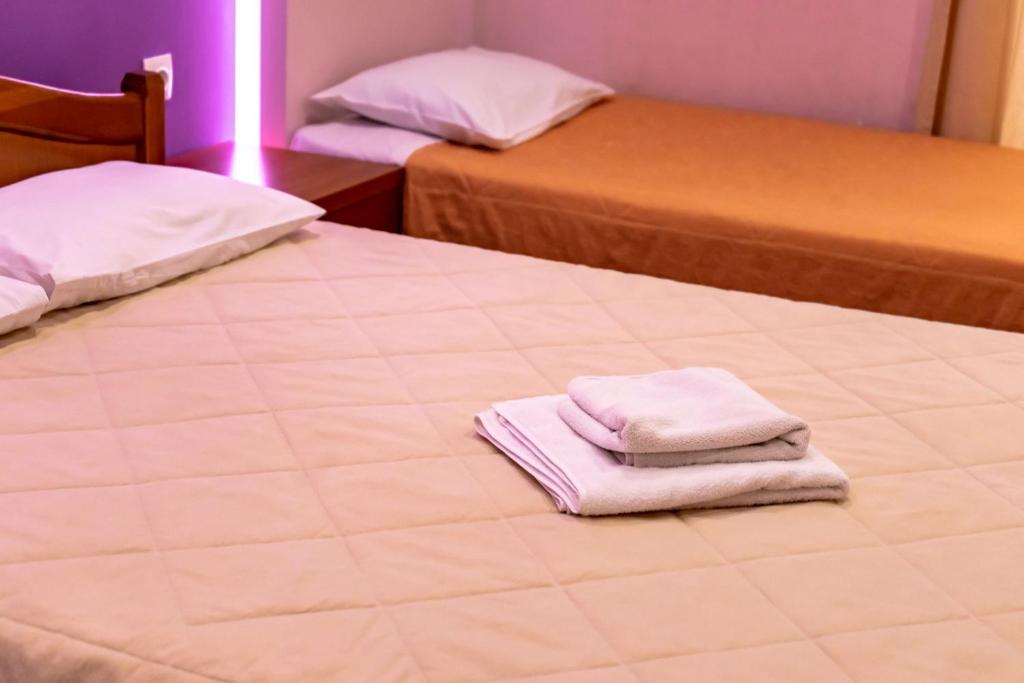 Postel nebo postele na pokoji v ubytování Telis Hotel