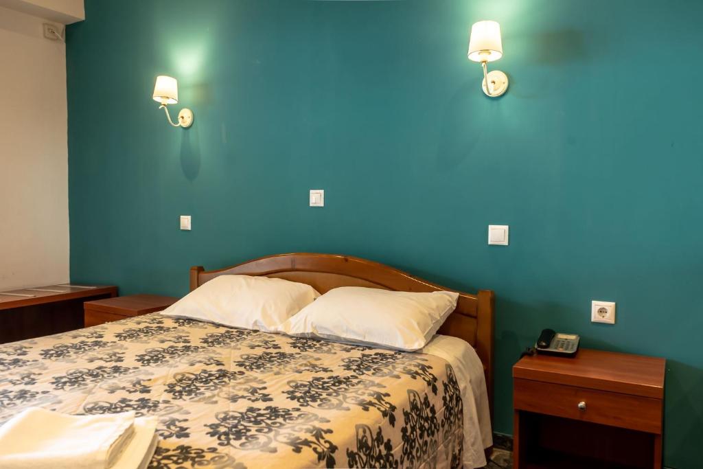 Postel nebo postele na pokoji v ubytování Telis Hotel