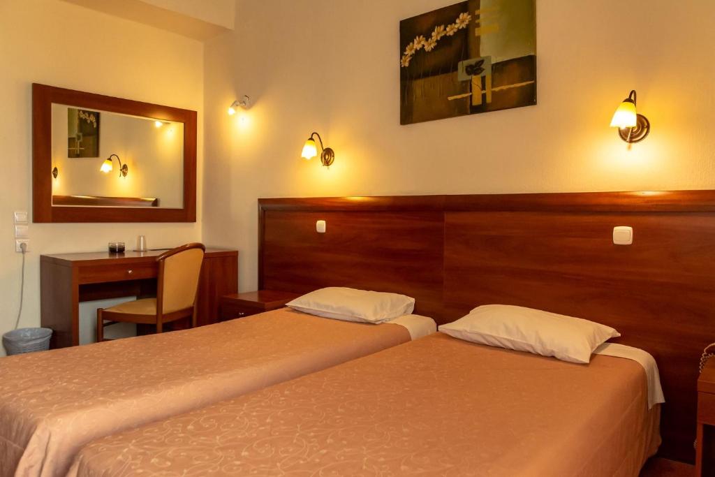 Postel nebo postele na pokoji v ubytování Telis Hotel