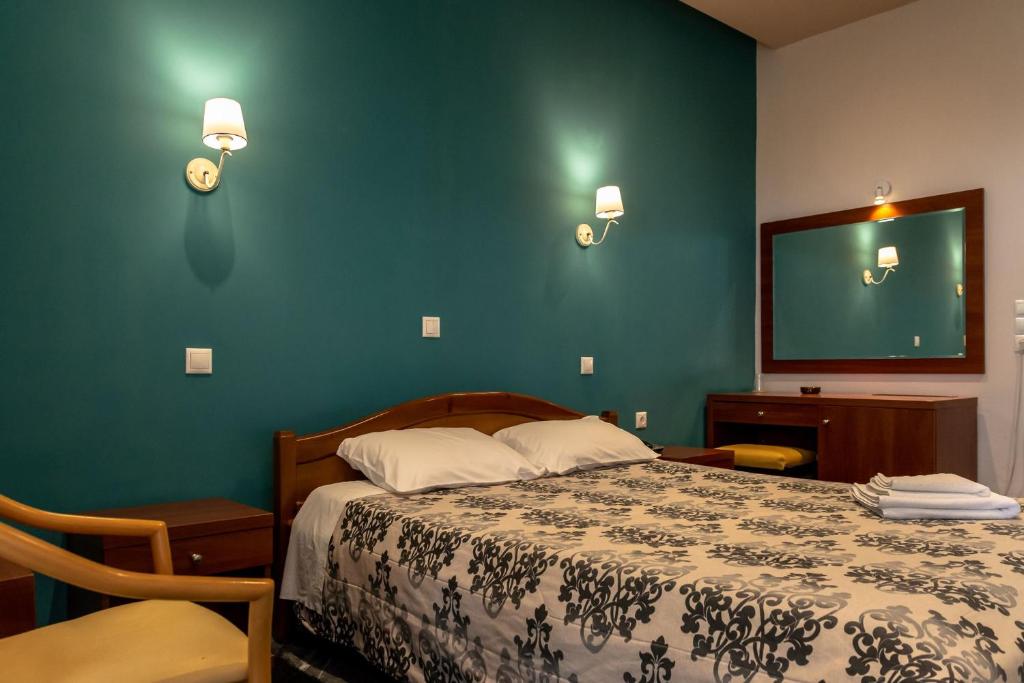 Postel nebo postele na pokoji v ubytování Telis Hotel