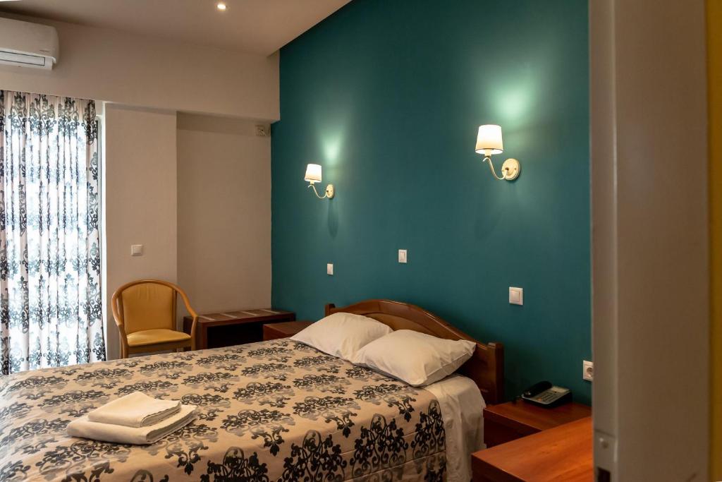 Postel nebo postele na pokoji v ubytování Telis Hotel