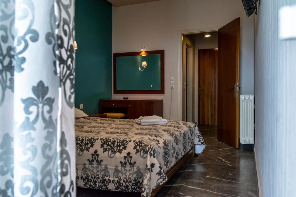 Postel nebo postele na pokoji v ubytování Telis Hotel
