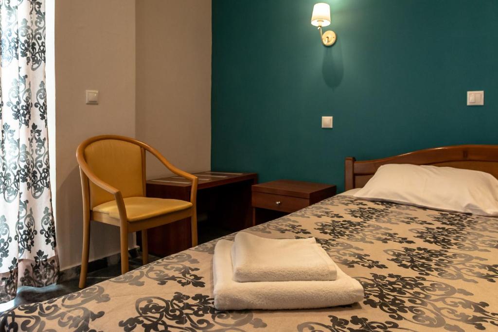 Postel nebo postele na pokoji v ubytování Telis Hotel