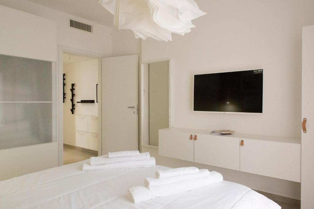 En eller flere senge i et værelse på Leflole Napoli