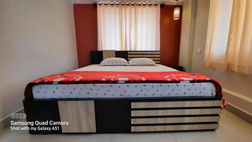 Postel nebo postele na pokoji v ubytování Varam Homestay