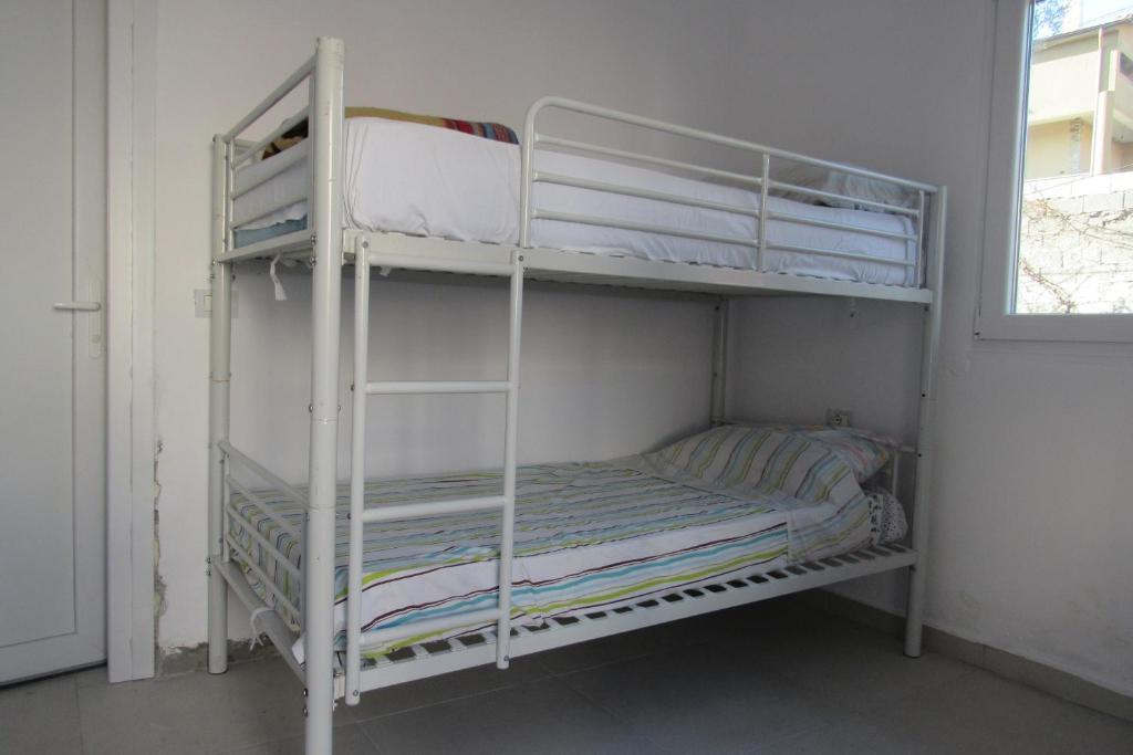 Postel nebo postele na pokoji v ubytování Elbasan Backpacker Hostel