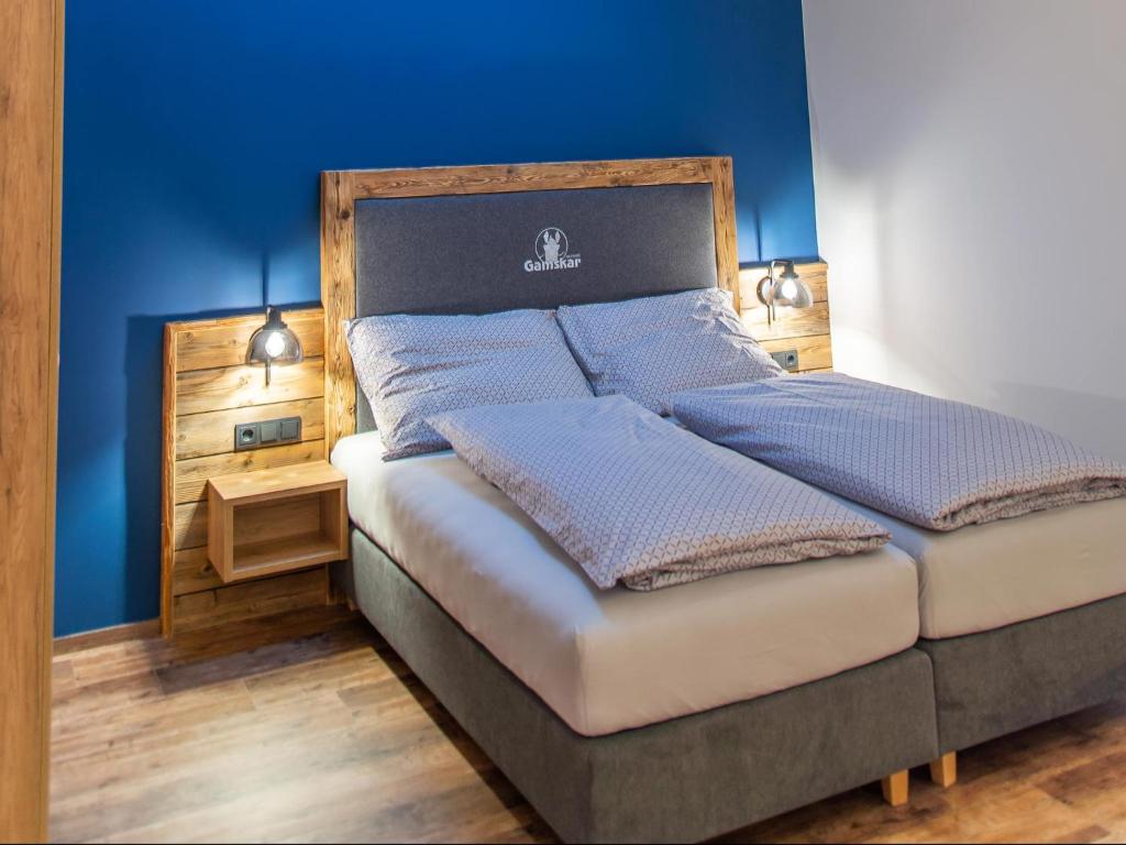 Postel nebo postele na pokoji v ubytování Gasthof Appartements Gamskar