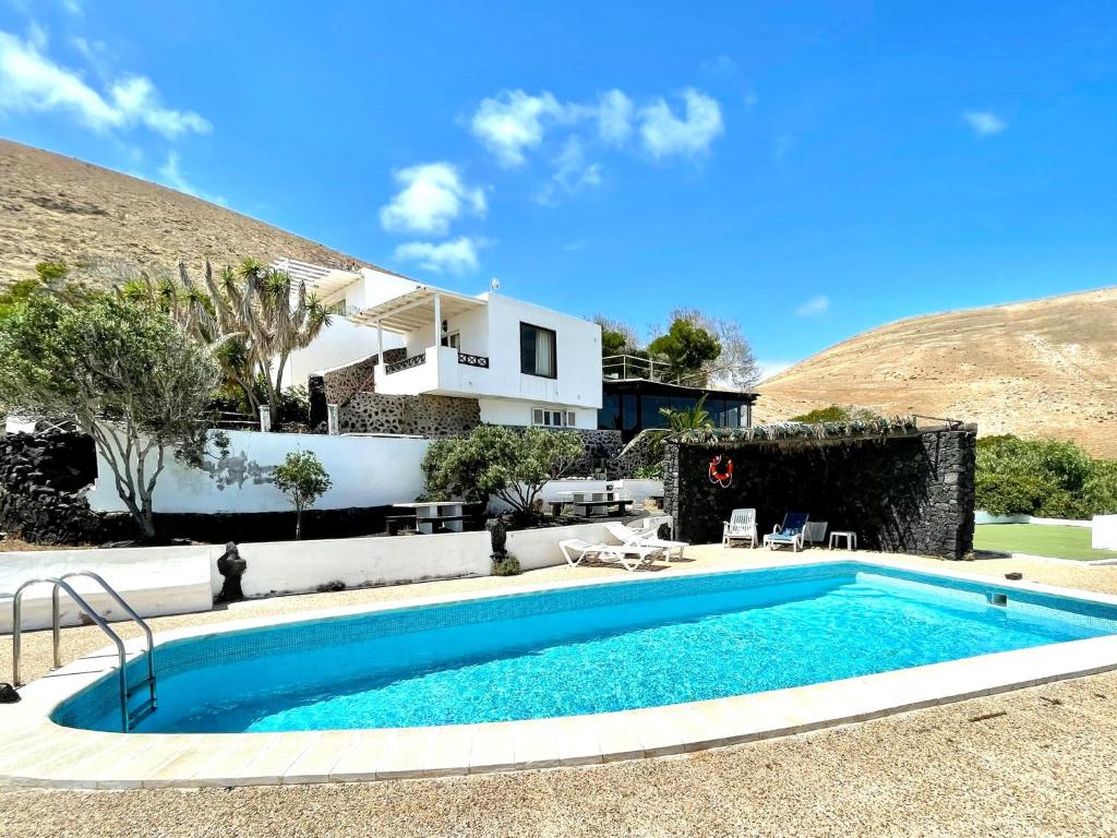 Apartamento D, Wifi, piscina con vista espectacular, Uga ...