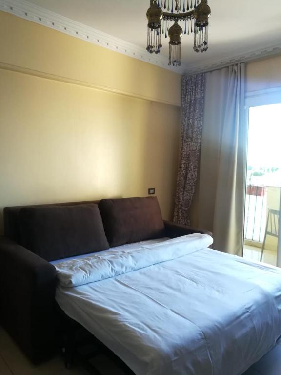 Postel nebo postele na pokoji v ubytování Philae Hotel Aswan