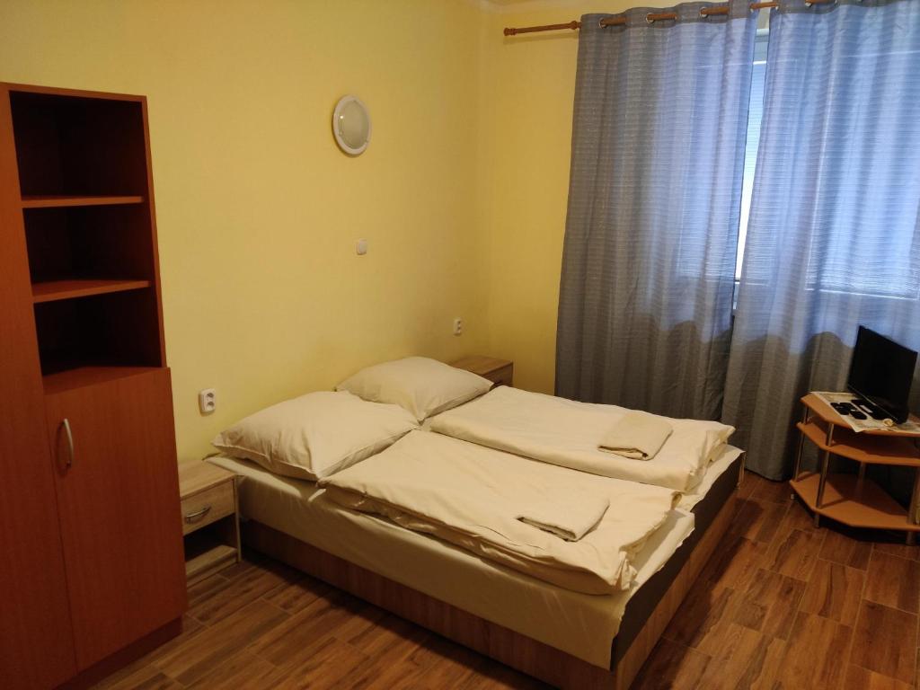 A bed or beds in a room at Rekreačné zariadenie Javorinka