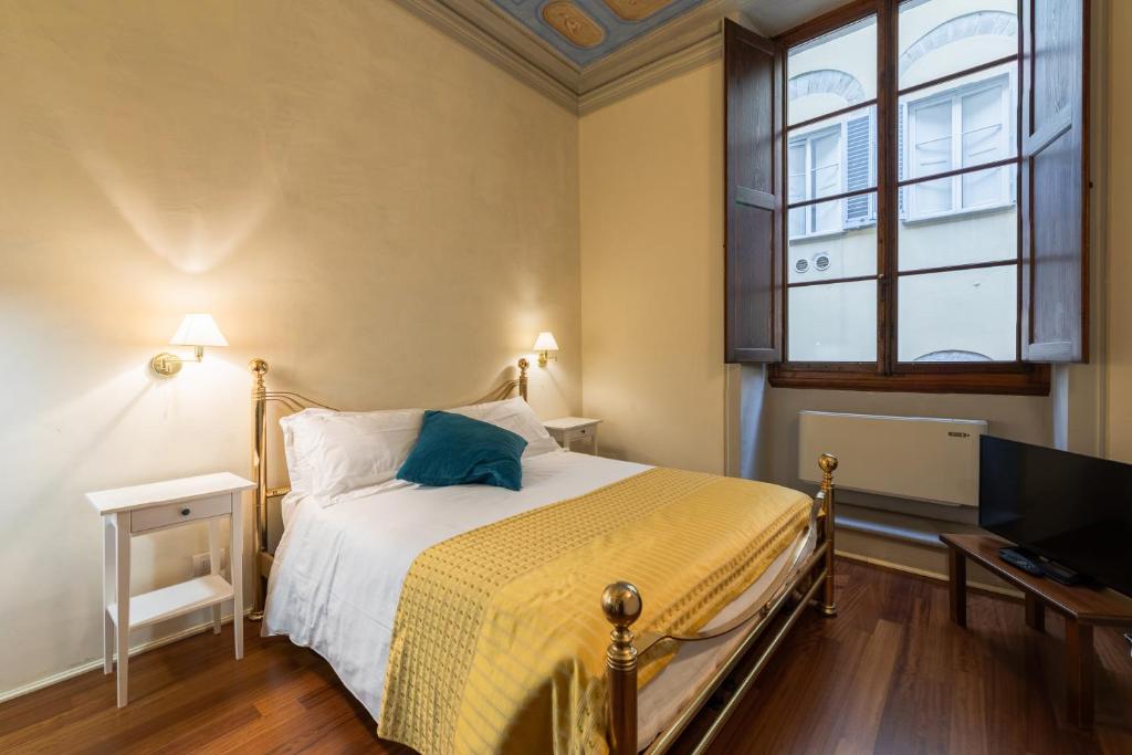 Katil atau katil-katil dalam bilik di Firenze Rentals - Piazza Signoria