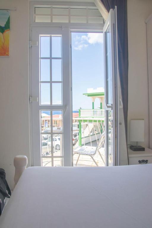 Postel nebo postele na pokoji v ubytování St. James Guesthouse