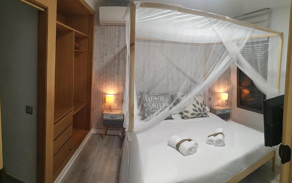 Postel nebo postele na pokoji v ubytování Suites Beach Nature