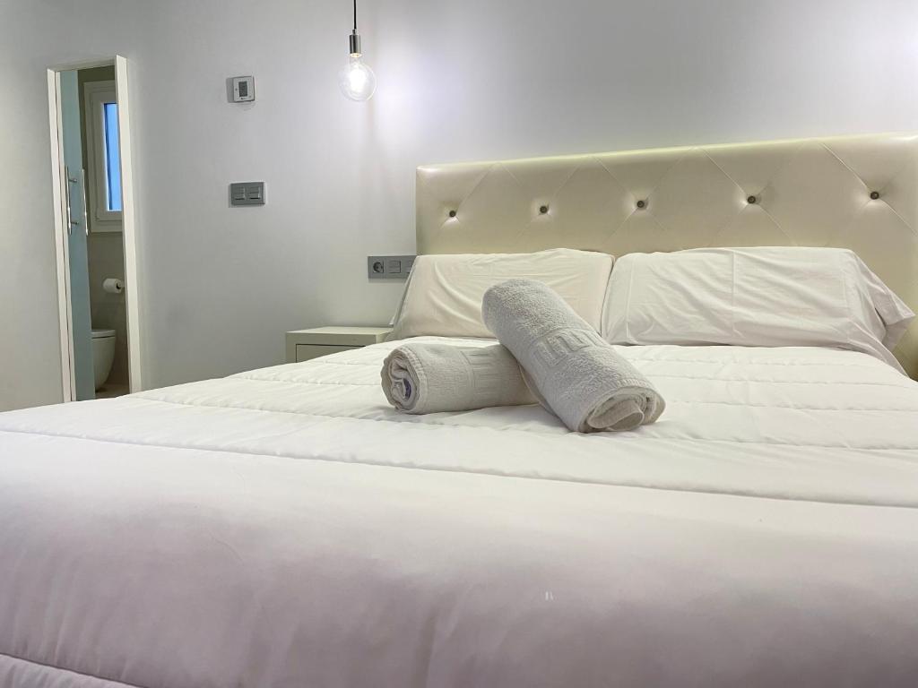 Posteľ alebo postele v izbe v ubytovaní Gav Los Remedios