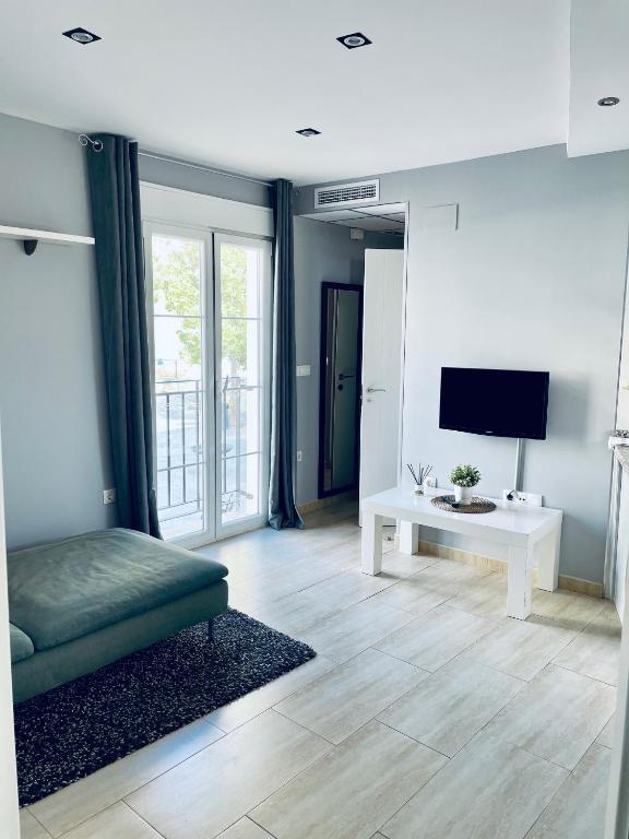 TV a/nebo společenská místnost v ubytování El Pont Alicante Apartments