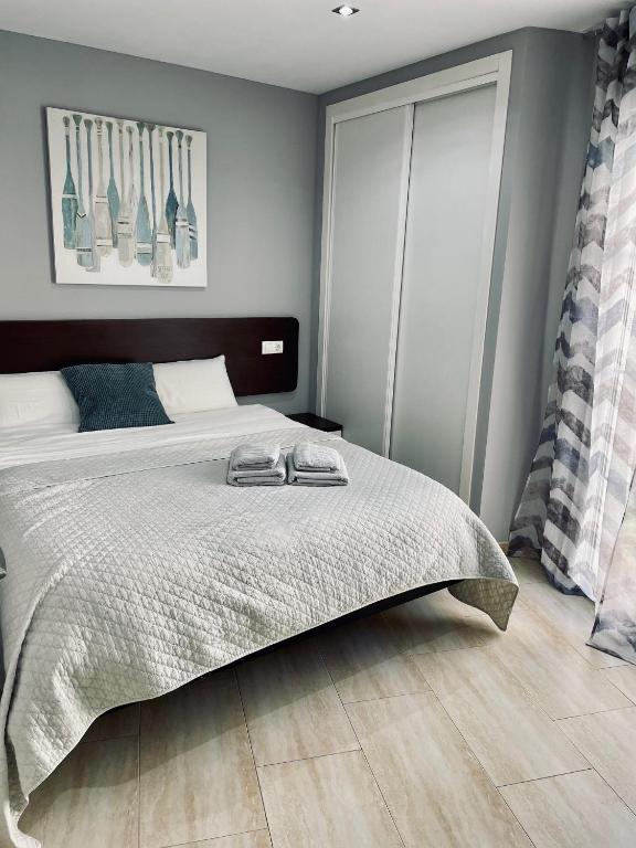Postel nebo postele na pokoji v ubytování El Pont Alicante Apartments
