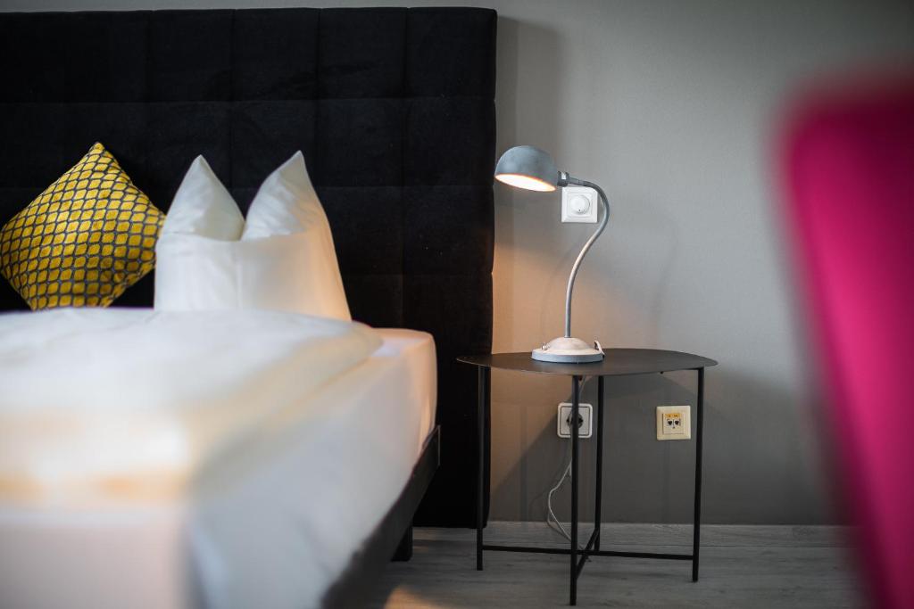 Postel nebo postele na pokoji v ubytování Hotel Parks