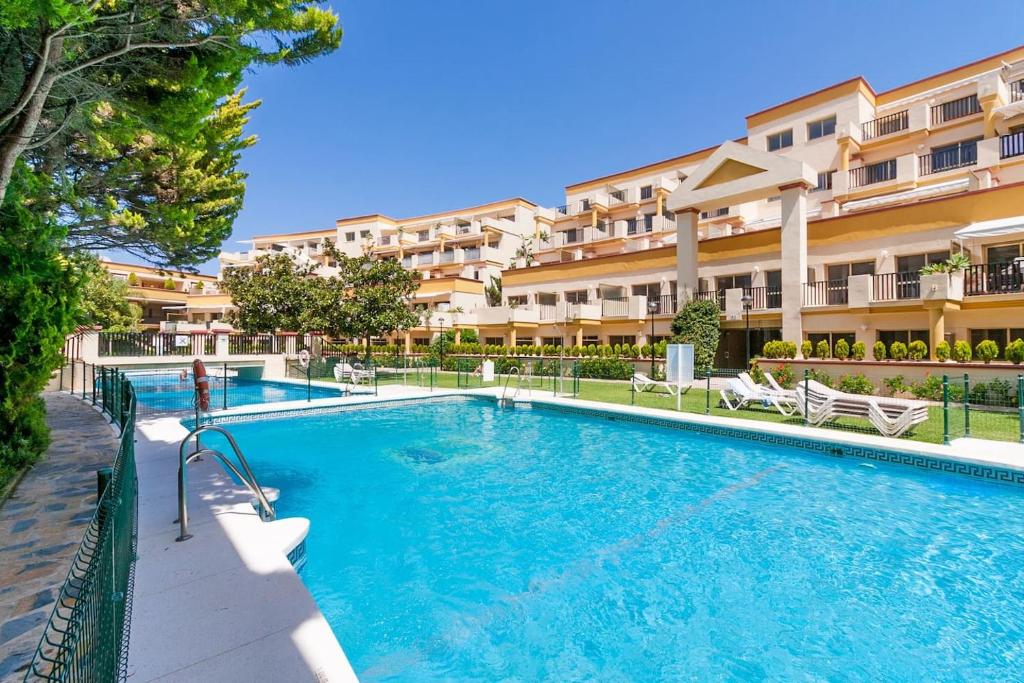 Bazén v ubytovaní OleHolidays 411 Romana Playa junto a la playa alebo v jeho blízkosti