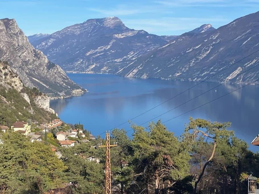 a view of a lake in the mountains at Un balcone sul Garda New house with panoramic views over Lake Garda in Tremosine Sul Garda