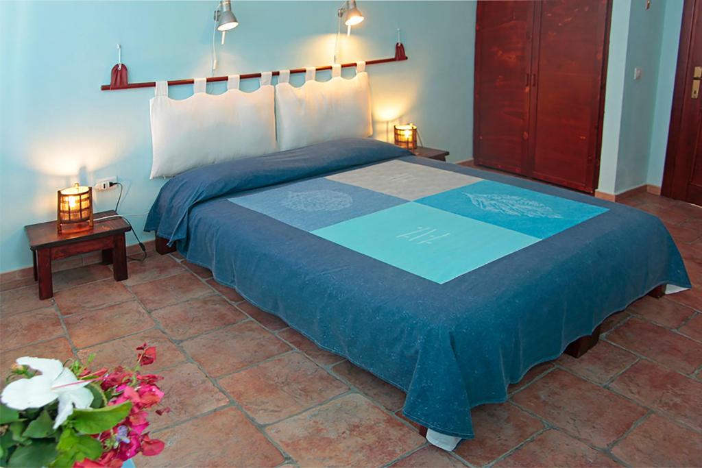 Postel nebo postele na pokoji v ubytování Alba B&B