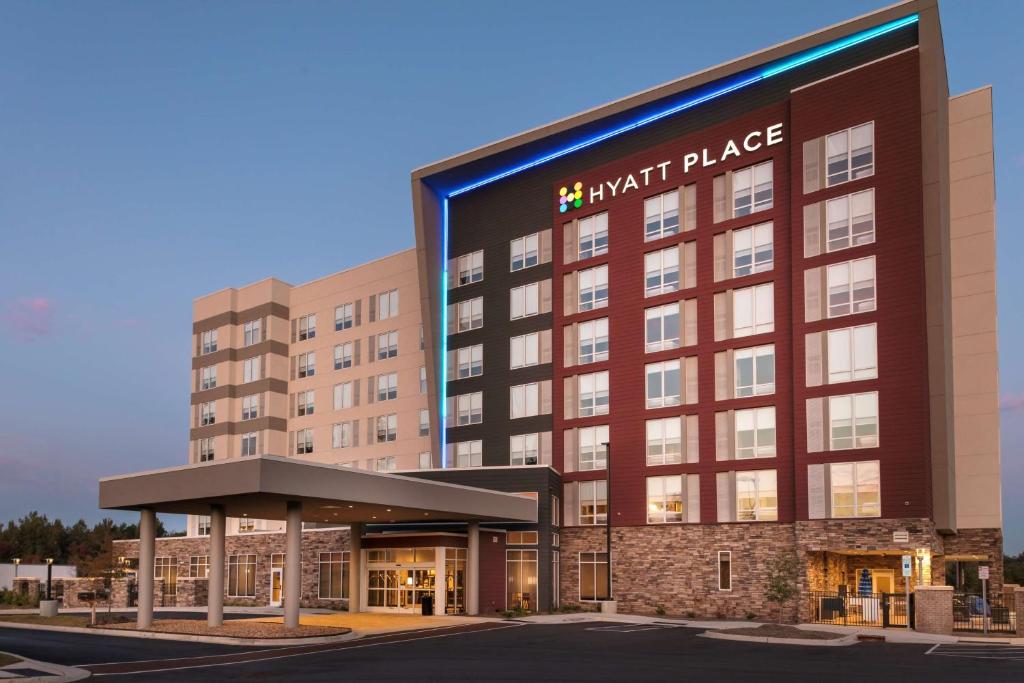 a rendering of the front of theriott place hotel at Hyatt Place Charlotte University in Charlotte