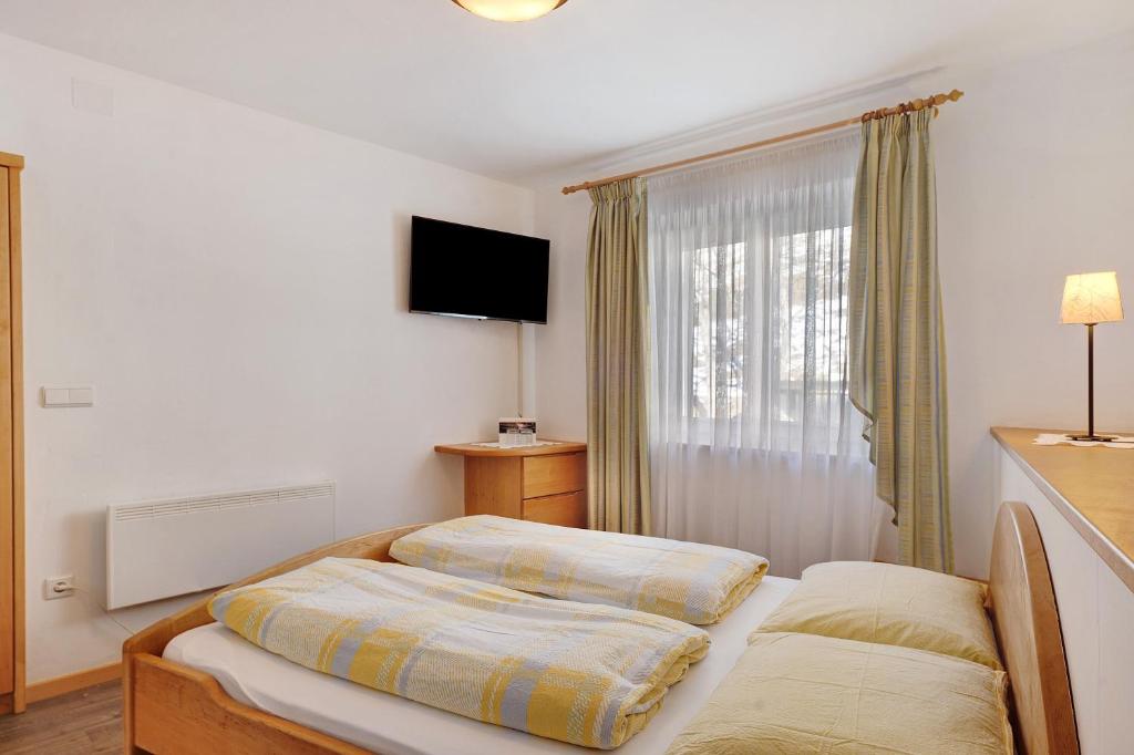 Posteľ alebo postele v izbe v ubytovaní Ferienwohnung Innerwalten 200
