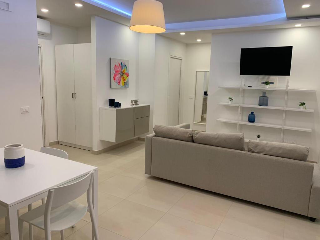 Televízia a/alebo spoločenská miestnosť v ubytovaní Residence Chanel